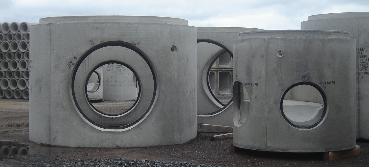 Various Sizes of A•LOK X•CELs Cast Into Manholes